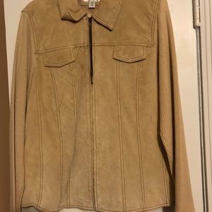Suede jacket with sweater sleeves.